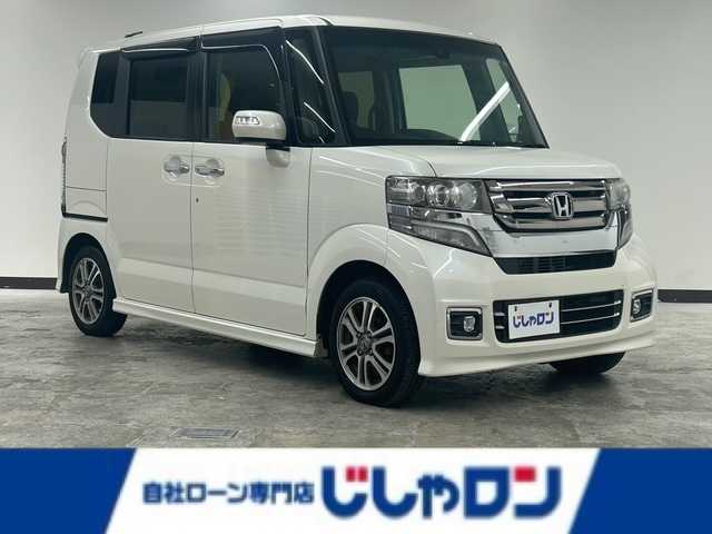 ホンダ Ｎ ＢＯＸ カスタム SSパッケージ 静岡県 2017(平29)年 9.5万km プレミアムホワイトパールⅡ (株)IDOMが運営する【じしゃロン浜松店】の自社ローン対象車両になります。こちらは現金ご利用時の価格です。自社ローンご希望の方は別途その旨お申付け下さい/純正フルセグナビ(VXM-175VFi)/純正14インチアルミホイール/バックカメラ/両側パワースライドドア/シートヒーター/シティブレーキアクティブシステム/ETC/ヘッドランプイルミネーション（青）/フォグランプ/電動ウインカーミラー/オートライト/サイドスポイラー/バックドアスポイラー/スマートキー/プッシュスタート