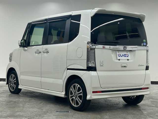 ホンダ Ｎ ＢＯＸ カスタム SSパッケージ 静岡県 2017(平29)年 9.5万km プレミアムホワイトパールⅡ (株)IDOMが運営する【じしゃロン浜松店】の自社ローン対象車両になります。こちらは現金ご利用時の価格です。自社ローンご希望の方は別途その旨お申付け下さい/純正フルセグナビ(VXM-175VFi)/純正14インチアルミホイール/バックカメラ/両側パワースライドドア/シートヒーター/シティブレーキアクティブシステム/ETC/ヘッドランプイルミネーション（青）/フォグランプ/電動ウインカーミラー/オートライト/サイドスポイラー/バックドアスポイラー/スマートキー/プッシュスタート