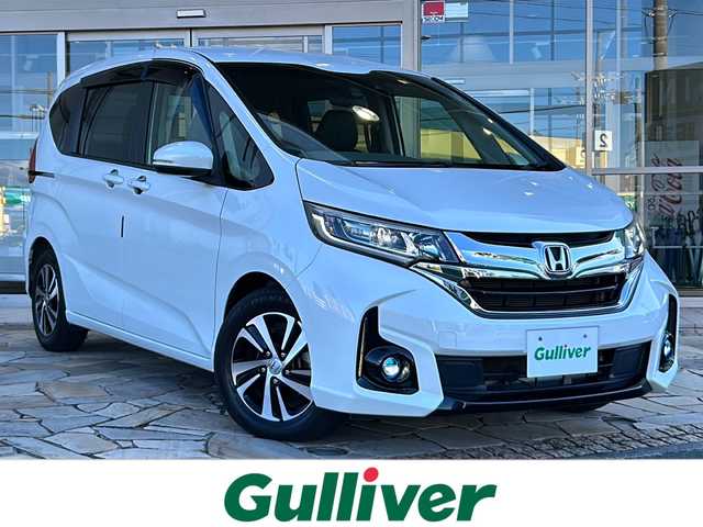 ホンダ フリード G ホンダセンシング 静岡県 2018(平30)年 7.2万km ホワイトオーキッドパール 純正ナビ/・CD/DVD/ipod/SD/USB/AUX/Bluetooth/・フルセグTV/ラジオ/主要装備/・レーダークルーズコントロール　/・ドライブレコーダー　/・バックカメラ　/・両側パワースライドドア　/・ホンダセンシング　/・ＥＴＣ　/・ステアリングリモコン　/・ハーフレザーシート　/・レーンキープアシスト　/・オートライト/・ステアリングリモコン/・ヒーテッドドアミラー/・純正アルミホイール/・純正フロアマット/・ハーフレザーシート/・LEDヘッドライト/・盗難防止装置/・プッシュスタート/・スマートキー