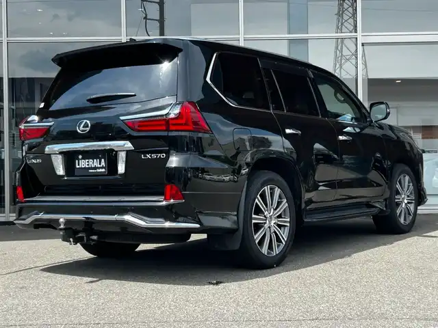 レクサス ＬＸ 570 富山県 2016(平28)年 9.5万km スターライトブラックガラスフレーク 外部検査実施済み/純正SDナビ/（DVD・ブルーレイ・フルセグTV・Bluetooth・USB・MSV）/アラウンドビューモニター/純正21インチアルミホイール/パワーバックドア/セーフティシステム/・プリクラッシュセーフティシステム/・レーンディパーチャーアラート/・アダクティブハイビームシステム/・レーダークルーズコントロール/LEDヘッドライト/スマートキー/ビルトインETC2.0/前方ドライブレコーダー/黒レザーシート/前席パワーシート/前席シートヒーター/前席エアシート/ブラインドスポットモニター/ヘッドアップディスプレイ/ハンドルヒーター/パドルシフト/クールBOX/ヒッチメンバー（電源7ピン）/横滑り防止機能/ロールセンシングカーテンエアバッグ/保証書/取扱説明書/スペアキー
