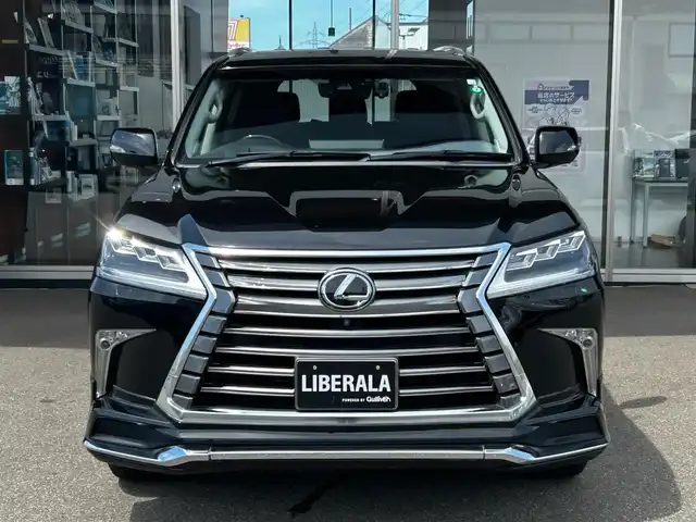 レクサス ＬＸ 570 富山県 2016(平28)年 9.5万km スターライトブラックガラスフレーク 外部検査実施済み/純正SDナビ/（DVD・ブルーレイ・フルセグTV・Bluetooth・USB・MSV）/アラウンドビューモニター/純正21インチアルミホイール/パワーバックドア/セーフティシステム/・プリクラッシュセーフティシステム/・レーンディパーチャーアラート/・アダクティブハイビームシステム/・レーダークルーズコントロール/LEDヘッドライト/スマートキー/ビルトインETC2.0/前方ドライブレコーダー/黒レザーシート/前席パワーシート/前席シートヒーター/前席エアシート/ブラインドスポットモニター/ヘッドアップディスプレイ/ハンドルヒーター/パドルシフト/クールBOX/ヒッチメンバー（電源7ピン）/横滑り防止機能/ロールセンシングカーテンエアバッグ/保証書/取扱説明書/スペアキー