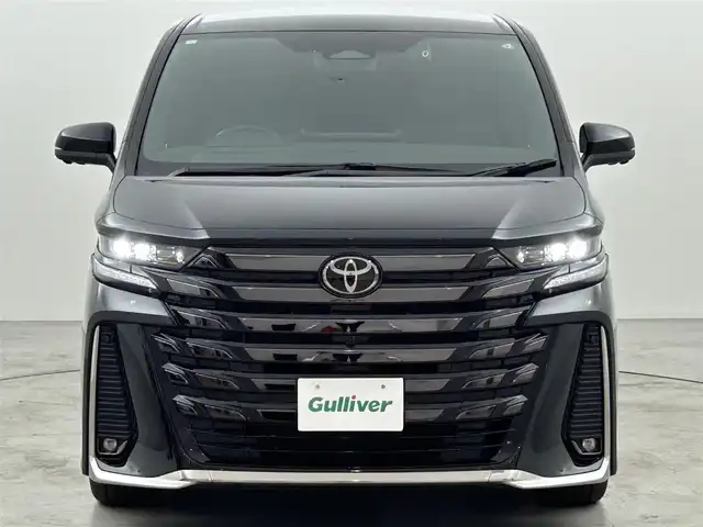 トヨタ ヴェルファイア ハイブリット Z プレミア 福岡県 2024(令6)年 1万km ブラック ガラスルーフ　/後席モニター　/メーカーナビ　/全方位カメラ　/ＥＴＣ２．０　/前後ドラレコ　/置くだけ充電　/デジタルルームミラー　/ＡＣＣ　/ＰＣＳ　/ＬＤＡ　/ＢＳＭ　/ＰＫＳＢ　/両側電動スライドドア　/パワーバックドア/本革レザーシート/1/2列目シートベンチレーション／ヒーター/パワーシート/オートステップ