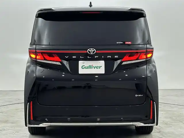 トヨタ ヴェルファイア ハイブリット Z プレミア 福岡県 2024(令6)年 1万km ブラック ガラスルーフ　/後席モニター　/メーカーナビ　/全方位カメラ　/ＥＴＣ２．０　/前後ドラレコ　/置くだけ充電　/デジタルルームミラー　/ＡＣＣ　/ＰＣＳ　/ＬＤＡ　/ＢＳＭ　/ＰＫＳＢ　/両側電動スライドドア　/パワーバックドア/本革レザーシート/1/2列目シートベンチレーション／ヒーター/パワーシート/オートステップ