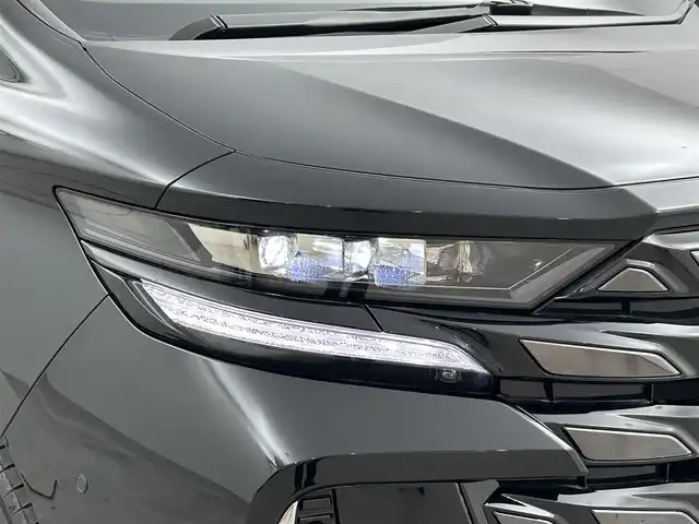 トヨタ ヴェルファイア ハイブリット Z プレミア 福岡県 2024(令6)年 1万km ブラック ガラスルーフ　/後席モニター　/メーカーナビ　/全方位カメラ　/ＥＴＣ２．０　/前後ドラレコ　/置くだけ充電　/デジタルルームミラー　/ＡＣＣ　/ＰＣＳ　/ＬＤＡ　/ＢＳＭ　/ＰＫＳＢ　/両側電動スライドドア　/パワーバックドア/本革レザーシート/1/2列目シートベンチレーション／ヒーター/パワーシート/オートステップ