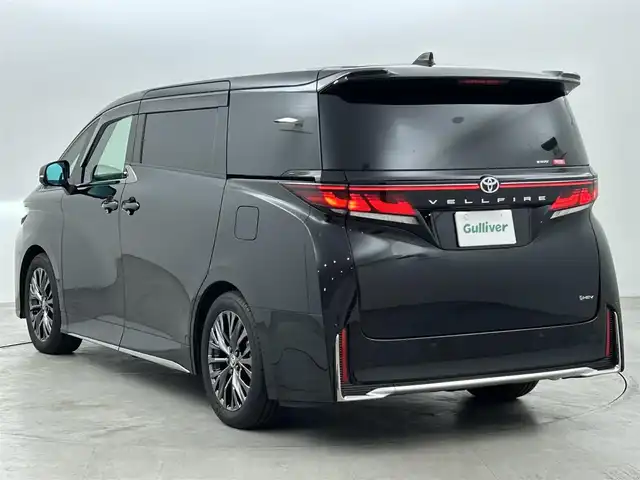 トヨタ ヴェルファイア ハイブリット Z プレミア 福岡県 2024(令6)年 1万km ブラック ガラスルーフ　/後席モニター　/メーカーナビ　/全方位カメラ　/ＥＴＣ２．０　/前後ドラレコ　/置くだけ充電　/デジタルルームミラー　/ＡＣＣ　/ＰＣＳ　/ＬＤＡ　/ＢＳＭ　/ＰＫＳＢ　/両側電動スライドドア　/パワーバックドア/本革レザーシート/1/2列目シートベンチレーション／ヒーター/パワーシート/オートステップ