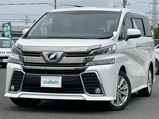 トヨタ ヴェルファイア Z Aエディション 道央・札幌 2017(平29)年 8.7万km ホワイトパールクリスタルシャイン ４WD/ワンオーナー/寒冷地仕様/純正ディーラーOPナビ/CD/DVD/BT/フルセグ/横滑り防止装置/クルーズコントロール/クリアランスソナー/バックカメラ/ビルトインETC/アイドリングストップ/ワイパーデアイサー/nanoe/ECOMODE/両側パワースライドドア/N席/２列目オットマン/革巻きステアリング/ステアリングリモコン/電動パーキング/ブレーキホールド/MTモード付AT/プッシュスタート/スマートキー/LEDヘッドライト/オートライト/フォグランプ/電動格納ミラー/ウィンカーミラー/純正フロアマット/ドアバイザー/純正エンジンスターター