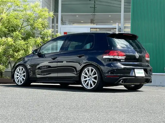 フォルクスワーゲン ゴルフ GTi 岡山県 2011(平23)年 9.1万km 黒 社外ETC/スペアキー/純正アルミホイール/シートヒーター/横滑り防止装置/W＋サイドエアバッグ/カーテンエアバッグ/エアロパーツ【リア】/ローダウン/保証書/取扱説明書