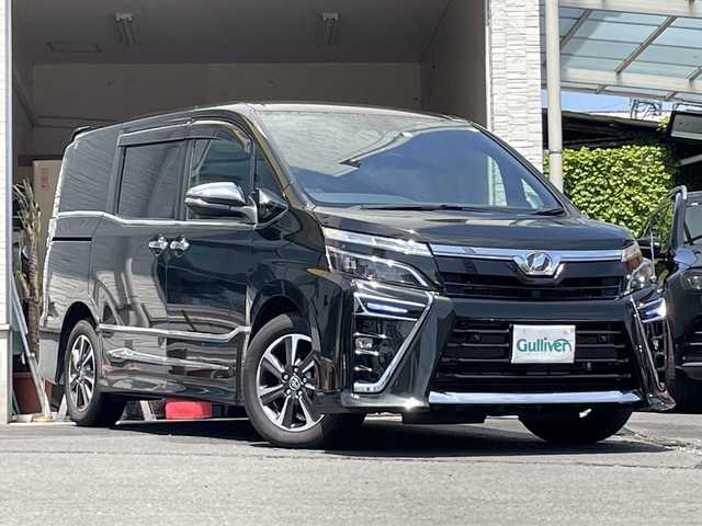 トヨタ ヴォクシー ZS 煌Ⅱ 大分県 2020(令2)年 1.6万km イナズマスパーキングブラックガラスフレーク ワンオーナー /両側パワースライドドア /純正ナビ/地デジ/Bluetooth/純正ビルトインETC/純正フロアマット/純正16インチルミホイール/純正LEDヘッドライト/オートライト/オートマチックハイビーム/コーナーセンサー/衝突被害軽減ブレーキ/横滑り防止装置/レーンキープアシスト/バックカメラ/クルーズコントロール/スマートキー/MTモード付きAT/5月3日から5月7日までお休みの為、書類発送及び車両搬出は5月8日以降になります。