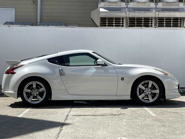 日産 フェアレディ Ｚ バージョンT 青森県 2009(平21)年 9.3万km ブリリアントホワイトパール 純正メモリナビ/AM/FM/CD/DVD/AUX/NISMOエアロ/V6ツインターボ/柿本マフラー/バックカメラ/社外ドライブレコーダー/シートヒーター/ハーフレザーシート/パドルシフト/純正フロアマット/スペアキー/純正AWサマータイヤ/取扱説明書/保証書