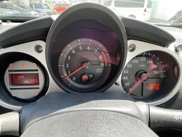 日産 フェアレディ Ｚ バージョンT 青森県 2009(平21)年 9.3万km ブリリアントホワイトパール 純正メモリナビ/AM/FM/CD/DVD/AUX/NISMOエアロ/V6ツインターボ/柿本マフラー/バックカメラ/社外ドライブレコーダー/シートヒーター/ハーフレザーシート/パドルシフト/純正フロアマット/スペアキー/純正AWサマータイヤ/取扱説明書/保証書