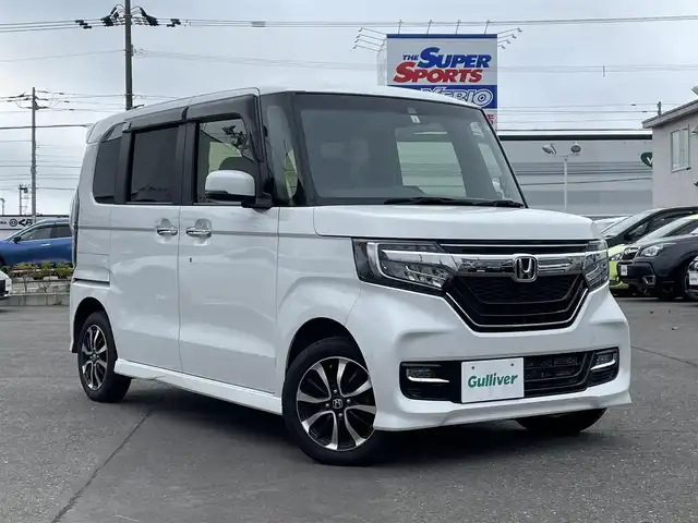 ホンダ Ｎ ＢＯＸ カスタム G L ホンダセンシング 道央・札幌 2019(平31)年 10.2万km プラチナホワイトパール ４WD/純正メモリナビ（CD/DVD/FM/AM/SD/BT)/フルセグ（走行中視聴可能）/バックカメラ/ウィンカーミラー/クルーズコントロール/ドアバイザー/プッシュスタート/片側パワースライドドア/ビルトインETC/オートライト/フォグランプ/前席シートヒーター/コーナーセンサー（前）/ステアリングスイッチ/ベンチシート/フルフラットシート/チップアップシート/レーンキープアシスト/衝突軽減ブレーキ/横滑り防止装置/サイドエアバッグ/カーテンエアバッグ