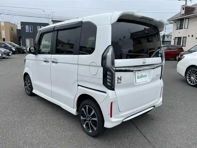 ホンダ Ｎ ＢＯＸ カスタム G L ホンダセンシング 道央・札幌 2019(平31)年 10.2万km プラチナホワイトパール ４WD/純正メモリナビ（CD/DVD/FM/AM/SD/BT)/フルセグ（走行中視聴可能）/バックカメラ/ウィンカーミラー/クルーズコントロール/ドアバイザー/プッシュスタート/片側パワースライドドア/ビルトインETC/オートライト/フォグランプ/前席シートヒーター/コーナーセンサー（前）/ステアリングスイッチ/ベンチシート/フルフラットシート/チップアップシート/レーンキープアシスト/衝突軽減ブレーキ/横滑り防止装置/サイドエアバッグ/カーテンエアバッグ