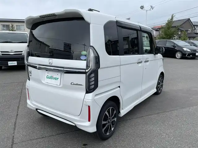 ホンダ Ｎ ＢＯＸ カスタム G L ホンダセンシング 道央・札幌 2019(平31)年 10.2万km プラチナホワイトパール ４WD/純正メモリナビ（CD/DVD/FM/AM/SD/BT)/フルセグ（走行中視聴可能）/バックカメラ/ウィンカーミラー/クルーズコントロール/ドアバイザー/プッシュスタート/片側パワースライドドア/ビルトインETC/オートライト/フォグランプ/前席シートヒーター/コーナーセンサー（前）/ステアリングスイッチ/ベンチシート/フルフラットシート/チップアップシート/レーンキープアシスト/衝突軽減ブレーキ/横滑り防止装置/サイドエアバッグ/カーテンエアバッグ