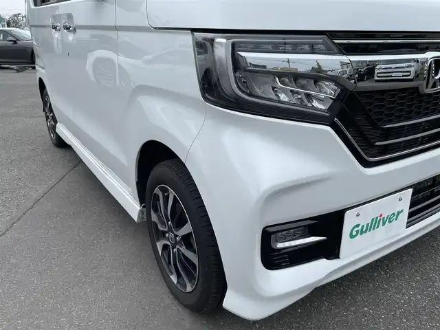 ホンダ Ｎ ＢＯＸ カスタム G L ホンダセンシング 道央・札幌 2019(平31)年 10.2万km プラチナホワイトパール ４WD/純正メモリナビ（CD/DVD/FM/AM/SD/BT)/フルセグ（走行中視聴可能）/バックカメラ/ウィンカーミラー/クルーズコントロール/ドアバイザー/プッシュスタート/片側パワースライドドア/ビルトインETC/オートライト/フォグランプ/前席シートヒーター/コーナーセンサー（前）/ステアリングスイッチ/ベンチシート/フルフラットシート/チップアップシート/レーンキープアシスト/衝突軽減ブレーキ/横滑り防止装置/サイドエアバッグ/カーテンエアバッグ