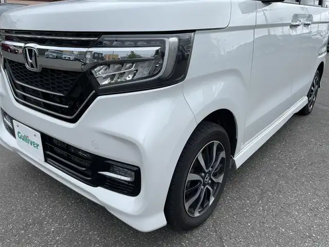 ホンダ Ｎ ＢＯＸ カスタム G L ホンダセンシング 道央・札幌 2019(平31)年 10.2万km プラチナホワイトパール ４WD/純正メモリナビ（CD/DVD/FM/AM/SD/BT)/フルセグ（走行中視聴可能）/バックカメラ/ウィンカーミラー/クルーズコントロール/ドアバイザー/プッシュスタート/片側パワースライドドア/ビルトインETC/オートライト/フォグランプ/前席シートヒーター/コーナーセンサー（前）/ステアリングスイッチ/ベンチシート/フルフラットシート/チップアップシート/レーンキープアシスト/衝突軽減ブレーキ/横滑り防止装置/サイドエアバッグ/カーテンエアバッグ