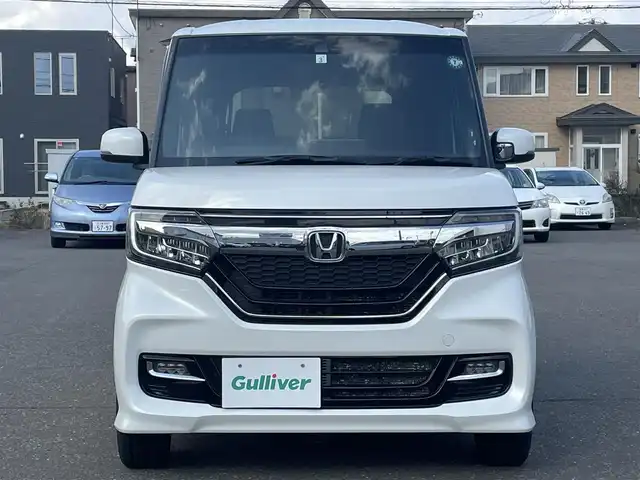 ホンダ Ｎ ＢＯＸ カスタム G L ホンダセンシング 道央・札幌 2019(平31)年 10.2万km プラチナホワイトパール 　４　W　D　/純正メモリナビ/（CD/DVD/FM/AM/SD/BT)/フルセグ（走行中視聴可能）/バックカメラ/ウィンカーミラー/クルーズコントロール/ドアバイザー/プッシュスタート/片側パワースライドドア/ビルトインETC/オートライト/フォグランプ/前席シートヒーター/コーナーセンサー（前）/ステアリングスイッチ/ベンチシート/フルフラットシート/チップアップシート/レーンキープアシスト/衝突軽減ブレーキ/横滑り防止装置/サイドエアバッグ/カーテンエアバッグ