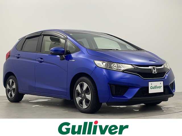 ホンダ フィット ハイブリット Lパッケージ 大阪府 2017(平29)年 5.2万km ブリリアントスポーティブルーメタリック2トーン 純正7インチインターナビ【VXM-174VFXi】/【AM/FM/CD/DVD/Bluetooth/フルセグTV】/ナビ装着用スペシャルパッケージ/バックカメラ/ETC/あんしんパッケージ/・シティブレーキアクティブシステム/・低速域衝突軽減ブレーキ/・誤発進抑制機能/・サイドカーテンエアバッグシステム/・前席用i-サイドエアバッグシステム/クルーズコントロール/ハーフレザーシート/タッチパネル式AAC/本革巻きステアリング/LEDヘッドライト/オートライト