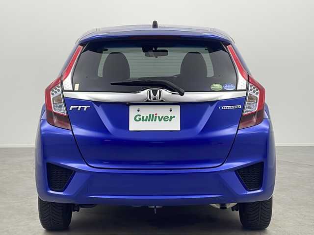 ホンダ フィット ハイブリット Lパッケージ 大阪府 2017(平29)年 5.2万km ブリリアントスポーティブルーメタリック2トーン 純正7インチインターナビ【VXM-174VFXi】/【AM/FM/CD/DVD/Bluetooth/フルセグTV】/ナビ装着用スペシャルパッケージ/バックカメラ/ETC/あんしんパッケージ/・シティブレーキアクティブシステム/・低速域衝突軽減ブレーキ/・誤発進抑制機能/・サイドカーテンエアバッグシステム/・前席用i-サイドエアバッグシステム/クルーズコントロール/ハーフレザーシート/タッチパネル式AAC/本革巻きステアリング/LEDヘッドライト/オートライト