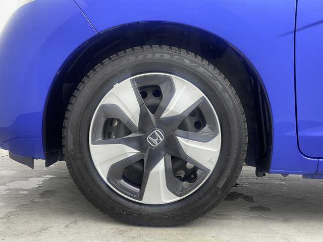 ホンダ フィット ハイブリット Lパッケージ 大阪府 2017(平29)年 5.2万km ブリリアントスポーティブルーメタリック2トーン 純正7インチインターナビ【VXM-174VFXi】/【AM/FM/CD/DVD/Bluetooth/フルセグTV】/ナビ装着用スペシャルパッケージ/バックカメラ/ETC/あんしんパッケージ/・シティブレーキアクティブシステム/・低速域衝突軽減ブレーキ/・誤発進抑制機能/・サイドカーテンエアバッグシステム/・前席用i-サイドエアバッグシステム/クルーズコントロール/ハーフレザーシート/タッチパネル式AAC/本革巻きステアリング/LEDヘッドライト/オートライト