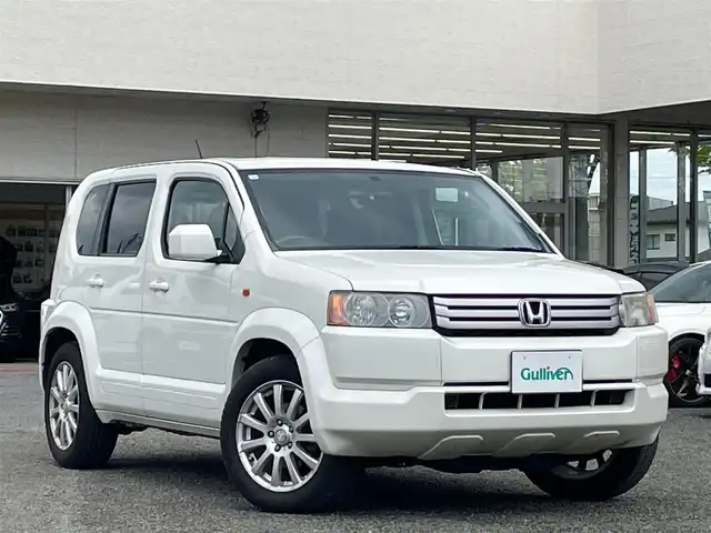 ホンダ クロスロード 18L Xパッケージ 宮城県 2007(平19)年 9.7万km プレミアムホワイトパール 純正ＨＤＤナビ/３列シート/バックカメラ/オートライト/スペアキー/ＤＶＤ／ＡＭ／ＦＭ