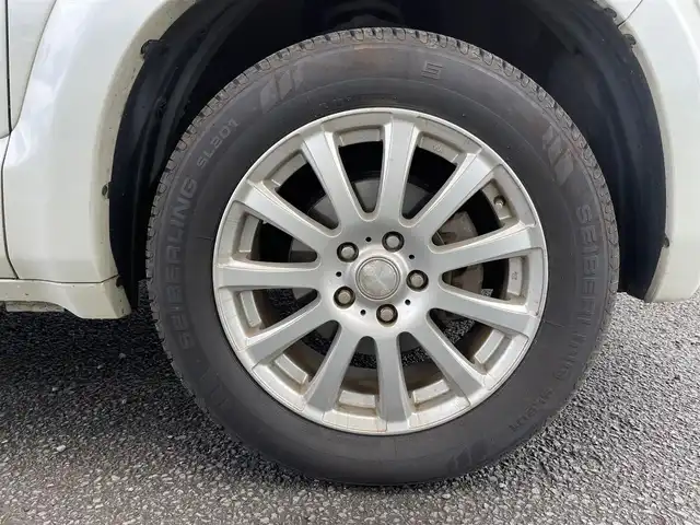 ホンダ クロスロード 18L Xパッケージ 宮城県 2007(平19)年 9.7万km プレミアムホワイトパール 純正ＨＤＤナビ/３列シート/バックカメラ/オートライト/スペアキー/ＤＶＤ／ＡＭ／ＦＭ