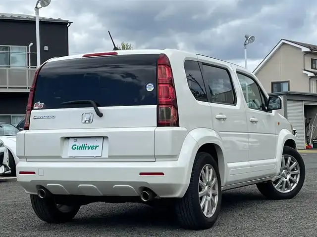 ホンダ クロスロード 18L Xパッケージ 宮城県 2007(平19)年 9.7万km プレミアムホワイトパール 純正ＨＤＤナビ/３列シート/バックカメラ/オートライト/スペアキー/ＤＶＤ／ＡＭ／ＦＭ