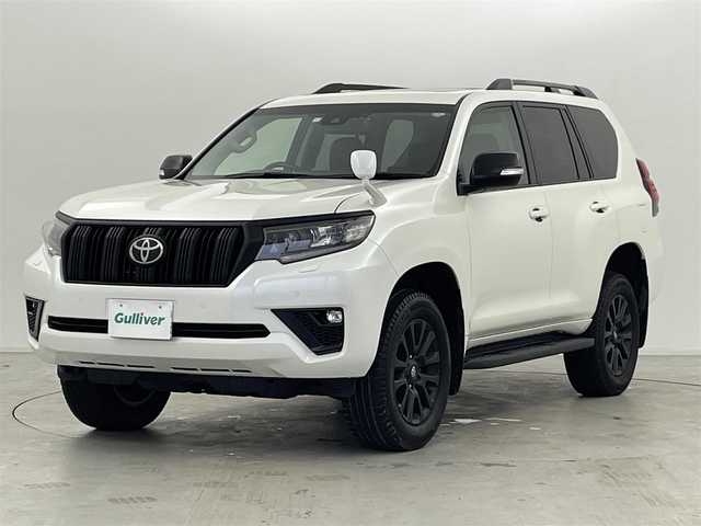 トヨタ ランドクルーザー プラド TX Lパッケージ マットブラED 群馬県 2023(令5)年 3.1万km ホワイトパールクリスタルシャイン チルト＆スライド電動ムーンルーフ（挟み込み防止機能付）/＝＝＝＝＝/純正9インチナビ（NSZT-Y68T)/・AM/FM/CD/DVD/SD/USB/HDMI/フルセグTV/バックカメラ/Toyota Safety Sense/・プリクラッシュセーフティ/・レーンディパーチャーアラート［LDA］/・オートマチックハイビーム［AHB］/・レーダークルーズコントロール（ブレーキ制御付）/・ロードサインアシスト［RSA］/・先行車発進告知機能［TMN］ /・パーキングサポートブレーキ（前後方静止物）/マットブラックエディション特別装備/・マットブラック塗装(サイドミラー/フロントグリル/バックドアガーニッシュ/18インチ専用アルミホイール/・ブラックルーフレール/黒本革シート/前席パワーシート/シートヒーター /シートベンチレーション/電動格納サードシート/社外前後ミラー型ドライブレコーダー/純正ビルトインETC/スマートキー/プッシュスタート