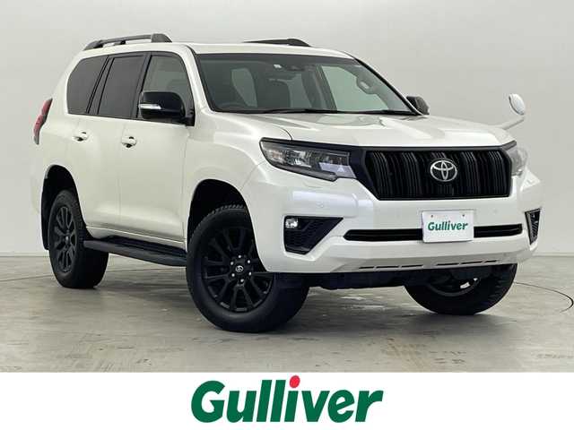 トヨタ ランドクルーザー プラド TX Lパッケージ マットブラED 群馬県 2023(令5)年 3.1万km ホワイトパールクリスタルシャイン チルト＆スライド電動ムーンルーフ（挟み込み防止機能付）/＝＝＝＝＝/純正9インチナビ（NSZT-Y68T)/・AM/FM/CD/DVD/SD/USB/HDMI/フルセグTV/バックカメラ/Toyota Safety Sense/・プリクラッシュセーフティ/・レーンディパーチャーアラート［LDA］/・オートマチックハイビーム［AHB］/・レーダークルーズコントロール（ブレーキ制御付）/・ロードサインアシスト［RSA］/・先行車発進告知機能［TMN］ /・パーキングサポートブレーキ（前後方静止物）/マットブラックエディション特別装備/・マットブラック塗装(サイドミラー/フロントグリル/バックドアガーニッシュ/18インチ専用アルミホイール/・ブラックルーフレール/黒本革シート/前席パワーシート/シートヒーター /シートベンチレーション/電動格納サードシート/社外前後ミラー型ドライブレコーダー/純正ビルトインETC/スマートキー/プッシュスタート