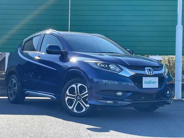 ホンダ ヴェゼル ハイブリッド Z 茨城県 2014(平26)年 5.6万km モルフォブルーP 社外ナビ/Bluetooth/フルセグTV/ドライブレコーダー/ETC/ハーフレザーシート/シートヒーター/横滑り防止装置/衝突軽減システム/オートライト/LEDヘッドライト/純正OPモデューロエアロパーツ/保証書/取扱説明書