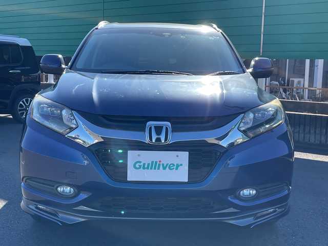 ホンダ ヴェゼル ハイブリッド Z 茨城県 2014(平26)年 5.6万km モルフォブルーP 社外ナビ/Bluetooth/フルセグTV/ドライブレコーダー/ETC/ハーフレザーシート/シートヒーター/横滑り防止装置/衝突軽減システム/オートライト/LEDヘッドライト/純正OPモデューロエアロパーツ/保証書/取扱説明書