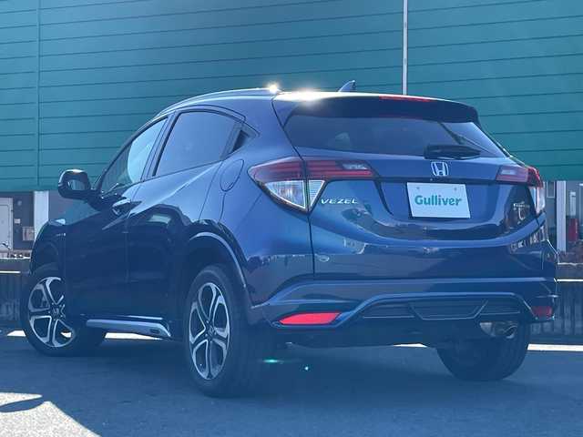 ホンダ ヴェゼル ハイブリッド Z 茨城県 2014(平26)年 5.6万km モルフォブルーP 社外ナビ/Bluetooth/フルセグTV/ドライブレコーダー/ETC/ハーフレザーシート/シートヒーター/横滑り防止装置/衝突軽減システム/オートライト/LEDヘッドライト/純正OPモデューロエアロパーツ/保証書/取扱説明書