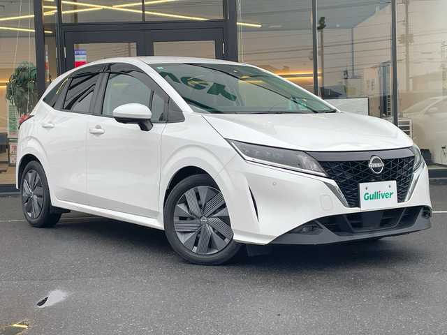 日産 ノート X 茨城県 2021(令3)年 6.6万km パール 純正ナビゲーション/フルセグＴＶ/ＵＳＢ/ＨＤＭＩ/ワイヤレス充電/全方位カメラ/ＥＴＣ/スポーツモード/ＥＶモード/レーンキープアシスト/衝突被害軽減システム/プッシュスタート/スマートキー/取扱説明書/ドアバイザー