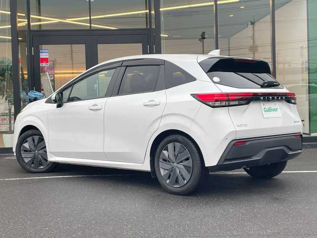 日産 ノート X 茨城県 2021(令3)年 6.6万km パール 純正ナビゲーション/フルセグＴＶ/ＵＳＢ/ＨＤＭＩ/ワイヤレス充電/全方位カメラ/ＥＴＣ/スポーツモード/ＥＶモード/レーンキープアシスト/衝突被害軽減システム/プッシュスタート/スマートキー/取扱説明書/ドアバイザー