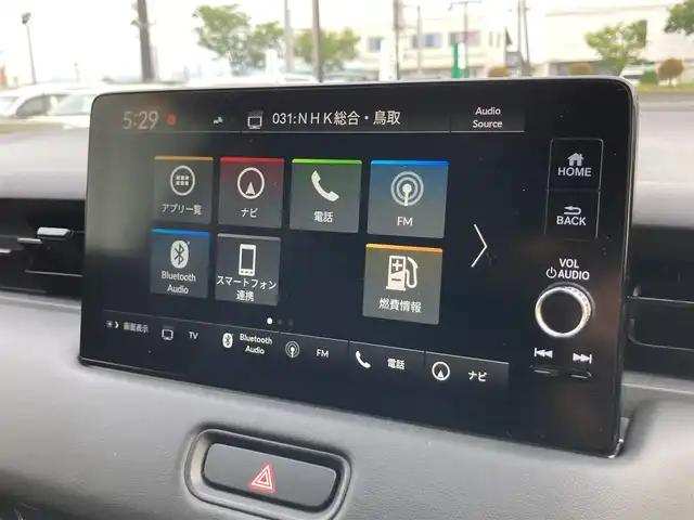 ホンダ ヴェゼル ハイブリッド e:HEV Z 鳥取県 2021(令3)年 0.5万km プレミアムサンライトホワイトパール 4・W・D/ワンオーナー/純正9インチナビ/フルセグ/BT/USB/マルチビューカメラシステム/ホンダセンシング/レーダークルーズコントロール/前後ドライブレコーダー・ETC2.0/ハーフレザーシート/前席シートヒーター/ステアリングヒーター/LEDヘットライト/純正18インチアルミホイール/ワイヤレス充電機能/プッシュエンジンスタート/スマートキー×2/フロアマット・ドアバイザー