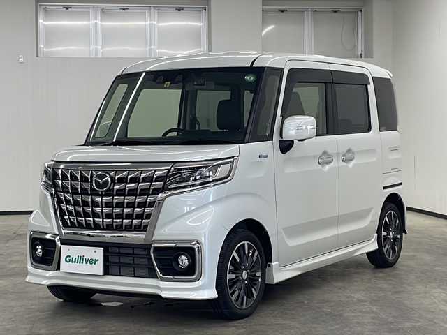マツダ フレアワゴン カスタムスタイル ハイブリッド XS 長崎県 2022(令4)年 1.2万km ピュアホワイトP ワンオーナー/禁煙車/社外ナビ（CN-RZ875）/CD/DVD/地デジテレビ/Bluetooth/アラウンドビューモニター/ドライブレコーダー/コーナーセンサー/衝突軽減システム/レーンキープアシスト/クルーズコントロール/ステアリングスイッチ/オートライト/LEDヘッドランプ/運転席側シートヒーター/ハーフレザーシート/取説/保証書