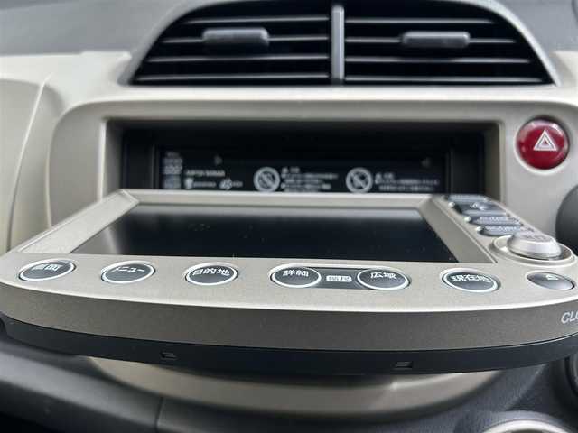 ホンダ フィット ハイブリット ナビ プレミアムセレクション 大阪府 2010(平22)年 7.2万km クリスタルブラックパール 純正ＨＤＤナビ/（ＣＤ／ＤＶＤ）/バックカメラ/純正フロアマット/純正１５インチアルミキャップ/ＥＴＣ/保証書/取扱説明書/記録簿/スペアキー