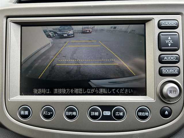 ホンダ フィット ハイブリット ナビ プレミアムセレクション 大阪府 2010(平22)年 7.2万km クリスタルブラックパール 純正ＨＤＤナビ/（ＣＤ／ＤＶＤ）/バックカメラ/純正フロアマット/純正１５インチアルミキャップ/ＥＴＣ/保証書/取扱説明書/記録簿/スペアキー