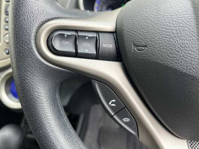 ホンダ フィット ハイブリット ナビ プレミアムセレクション 大阪府 2010(平22)年 7.2万km クリスタルブラックパール 純正ＨＤＤナビ/（ＣＤ／ＤＶＤ）/バックカメラ/純正フロアマット/純正１５インチアルミキャップ/ＥＴＣ/保証書/取扱説明書/記録簿/スペアキー