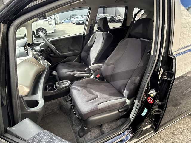 ホンダ フィット ハイブリット ナビ プレミアムセレクション 大阪府 2010(平22)年 7.2万km クリスタルブラックパール 純正ＨＤＤナビ/（ＣＤ／ＤＶＤ）/バックカメラ/純正フロアマット/純正１５インチアルミキャップ/ＥＴＣ/保証書/取扱説明書/記録簿/スペアキー