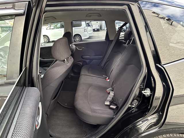 ホンダ フィット ハイブリット ナビ プレミアムセレクション 大阪府 2010(平22)年 7.2万km クリスタルブラックパール 純正ＨＤＤナビ/（ＣＤ／ＤＶＤ）/バックカメラ/純正フロアマット/純正１５インチアルミキャップ/ＥＴＣ/保証書/取扱説明書/記録簿/スペアキー