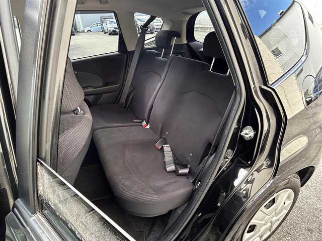 ホンダ フィット ハイブリット ナビ プレミアムセレクション 大阪府 2010(平22)年 7.2万km クリスタルブラックパール 純正ＨＤＤナビ/（ＣＤ／ＤＶＤ）/バックカメラ/純正フロアマット/純正１５インチアルミキャップ/ＥＴＣ/保証書/取扱説明書/記録簿/スペアキー