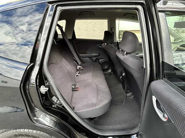 ホンダ フィット ハイブリット ナビ プレミアムセレクション 大阪府 2010(平22)年 7.2万km クリスタルブラックパール 純正ＨＤＤナビ/（ＣＤ／ＤＶＤ）/バックカメラ/純正フロアマット/純正１５インチアルミキャップ/ＥＴＣ/保証書/取扱説明書/記録簿/スペアキー