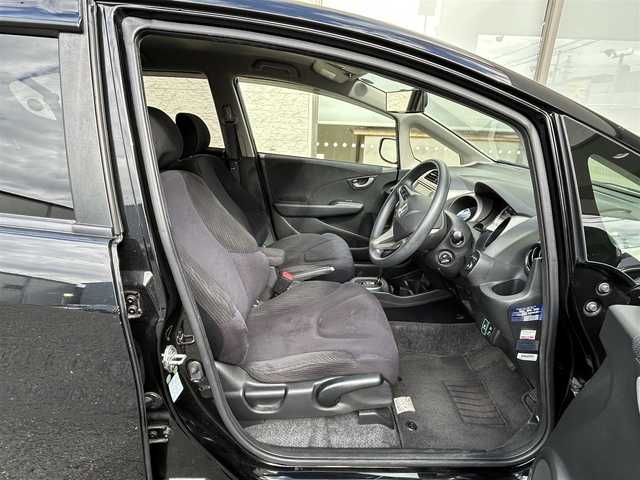 ホンダ フィット ハイブリット ナビ プレミアムセレクション 大阪府 2010(平22)年 7.2万km クリスタルブラックパール 純正ＨＤＤナビ/（ＣＤ／ＤＶＤ）/バックカメラ/純正フロアマット/純正１５インチアルミキャップ/ＥＴＣ/保証書/取扱説明書/記録簿/スペアキー