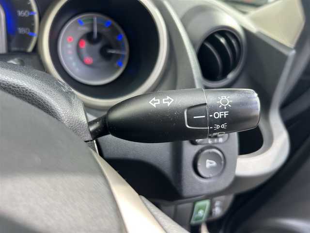 ホンダ フィット ハイブリット ナビ プレミアムセレクション 大阪府 2010(平22)年 7.2万km クリスタルブラックパール 純正ＨＤＤナビ/（ＣＤ／ＤＶＤ）/バックカメラ/純正フロアマット/純正１５インチアルミキャップ/ＥＴＣ/保証書/取扱説明書/記録簿/スペアキー