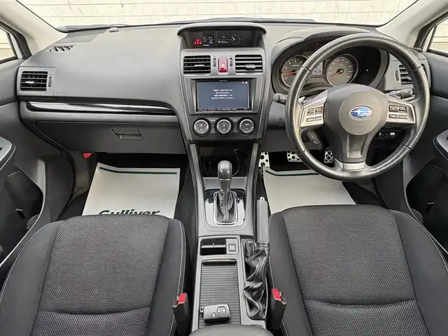 スバル インプレッサ ＸＶ 2．0i－L アイサイト 岩手県 2014(平26)年 8.7万km サテンホワイトパール 禁煙車/ワンオーナー/4WD/DISTONE SOUND/追従型クルーズコントロール/純正ナビ/→フルセグTV/Bluetooth/CD/DVD/FM/AM/バックカメラ/ステアリングスイッチ/横滑り防止装置/レーンキープアシスト/衝突軽減システム/オートライト/フォグライト/〇プッシュスタート/〇パドルシフト/〇アルミペダル/〇電動格納ミラー/〇ウィンカーミラー/〇ドアバイザー/〇フロアマット/〇シガーソケット/〇スマートキー/前後ドライブレコーダー/ETC