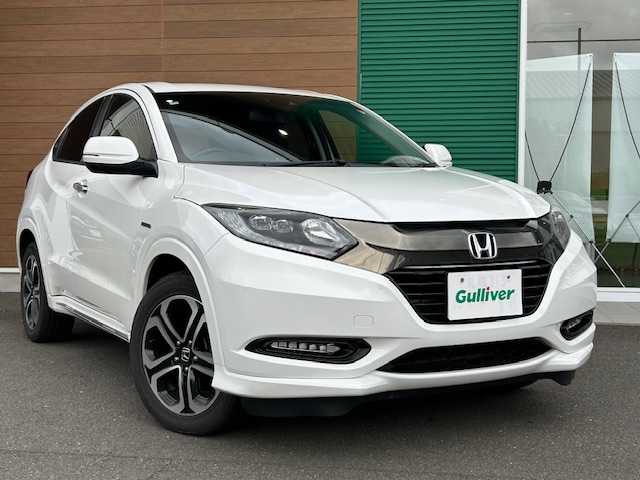 ホンダ ヴェゼル ハイブリッド Z ホンダセンシング 静岡県 2016(平28)年 14.5万km ホワイトオーキッドパール ETC/純正ナビ/Bluetooth/スポーツモード/ブレーキホールド/AWD/パドルシフト/アダプティブクルーズコントロール/レーンキープアシスト/シートヒーター/純正アルミホイール/ハイブリッド専用デザインメーター/ホンダセンシング/LEDフォグライト/ルーフレール（FF)/エンジンスターター