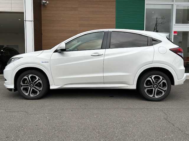 ホンダ ヴェゼル ハイブリッド Z ホンダセンシング 静岡県 2016(平28)年 14.5万km ホワイトオーキッドパール ETC/純正ナビ/Bluetooth/スポーツモード/ブレーキホールド/AWD/パドルシフト/アダプティブクルーズコントロール/レーンキープアシスト/シートヒーター/純正アルミホイール/ハイブリッド専用デザインメーター/ホンダセンシング/LEDフォグライト/ルーフレール（FF)/エンジンスターター