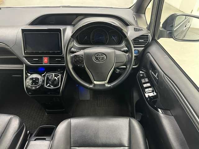 トヨタ エスクァイア ハイブリッド Gi 兵庫県 2018(平30)年 5.6万km スパークリングブラックパールクリスタルシャイン 純正メモリナビ(CD/DVD/Bluetooth/フルセグ/SD)/バックカメラ/両側パワースライドドア/社外エアロ/純正15インチアルミホイール/純正フロアマット/レザーシート/シートヒーター/クルーズコントロール/オートライト/オートマチックハイビーム/LEDヘッドライト/LEDフォグライト/ビルトインETC2.0