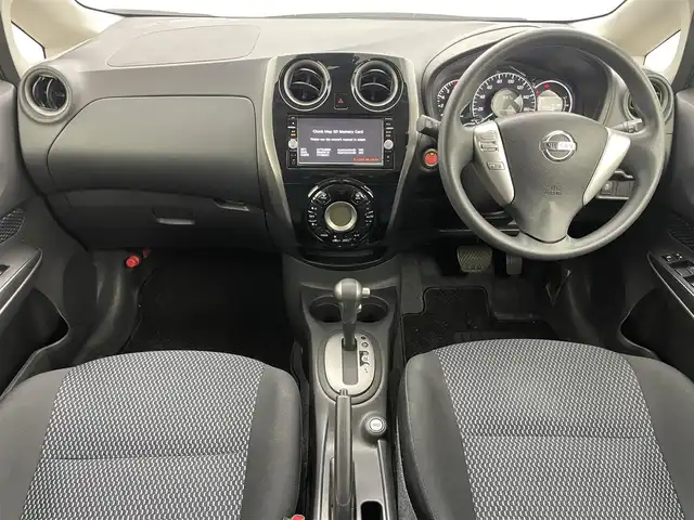 日産 ノート X DIG－S Vセレ +セーフ 岡山県 2015(平27)年 6.8万km ダークメタルグレー 純正7インチナビ/「BT/CD/DVD/フルセグTV/USB」/型番:MC315D-W/アラウンドビューモニター/LEDヘッドライト/オートライト/ＥＴＣ/衝突軽減ブレーキシステム/横滑り防止装置　/社外１４インチアルミ　/コーナーセンサー（前後）/スマートキー×1/プッシュスタート