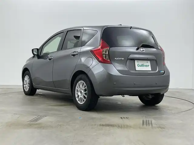 日産 ノート X DIG－S Vセレ +セーフ 岡山県 2015(平27)年 6.8万km ダークメタルグレー 純正7インチナビ/「BT/CD/DVD/フルセグTV/USB」/型番:MC315D-W/アラウンドビューモニター/LEDヘッドライト/オートライト/ＥＴＣ/衝突軽減ブレーキシステム/横滑り防止装置　/社外１４インチアルミ　/コーナーセンサー（前後）/スマートキー×1/プッシュスタート